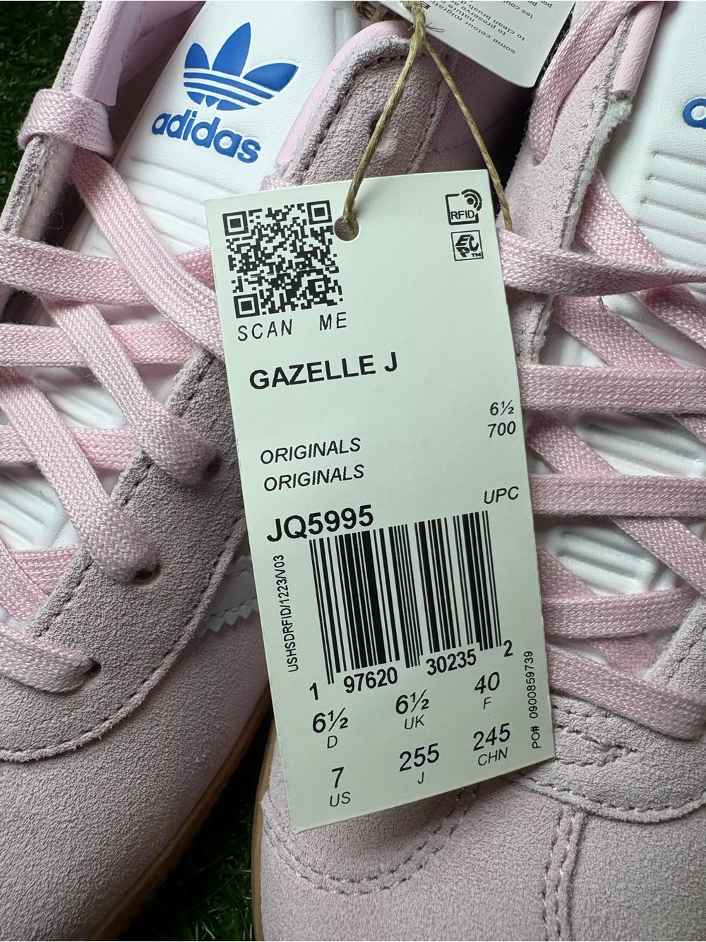 Adidas Gazelle Suede Sneakers in Light Pink with white Stripes and a blue heel. - Picture 5 of 8